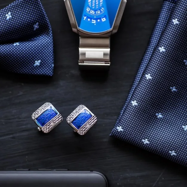 A detailed flat lay of professional accessories including a classic tie, a delicate scarf, and a clean pocket square, arranged to show complementary colors and textures suitable for an interview.