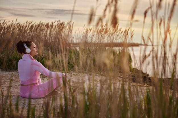 A person enjoying a peaceful moment outdoors, perhaps doing gentle yoga or meditation in a natural setting, signifying stress reduction and environmental harmony for sensitive skin care.