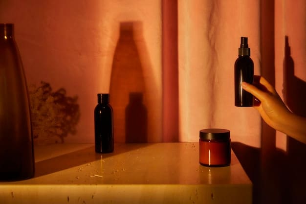 A person's hand reaching for a bottle of serum on a vanity, with blurred, warm lighting in the background, suggesting an evening routine.