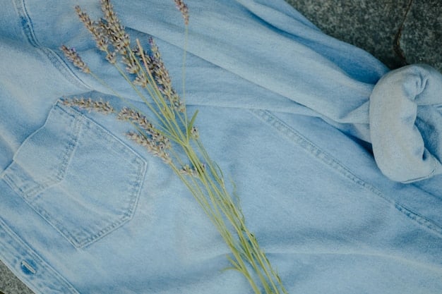 A detailed flat lay of various sustainable fashion items: a pair of organic cotton jeans, a re-purposed silk scarf, a linen shirt, and a pair of minimalist, ethically sourced leather sandals, all in natural, earthy tones.