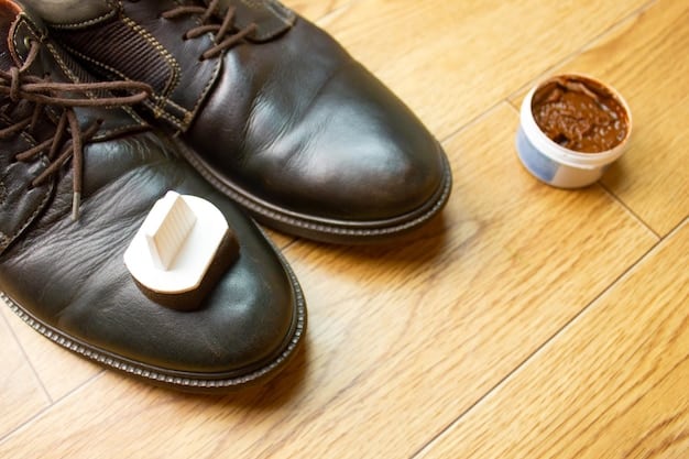 A detailed shot of a pair of well-worn, high-quality leather loafers on a polished wooden floor, showing their rich patina and sturdy stitching, emphasizing the enduring quality that comes with age.