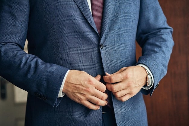 A person's hand wearing a sophisticated statement watch, adjusting the cuff of a tailored suit. The watch is clearly visible and elegant, with soft, directional lighting highlighting its features and the texture of the fabric. The setting is professional and refined.