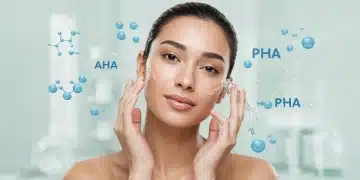 Woman applying serum, illustrating the 2025 Guide to Exfoliation: Choosing Between AHAs, BHAs, and PHAs for Your Skin Type